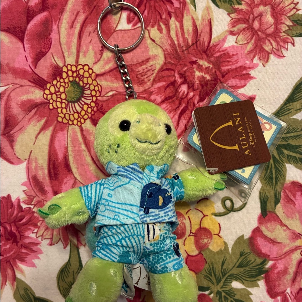 Disney Aulani Green Plush Turtle Keychain with Blue Hawaiian Outfit